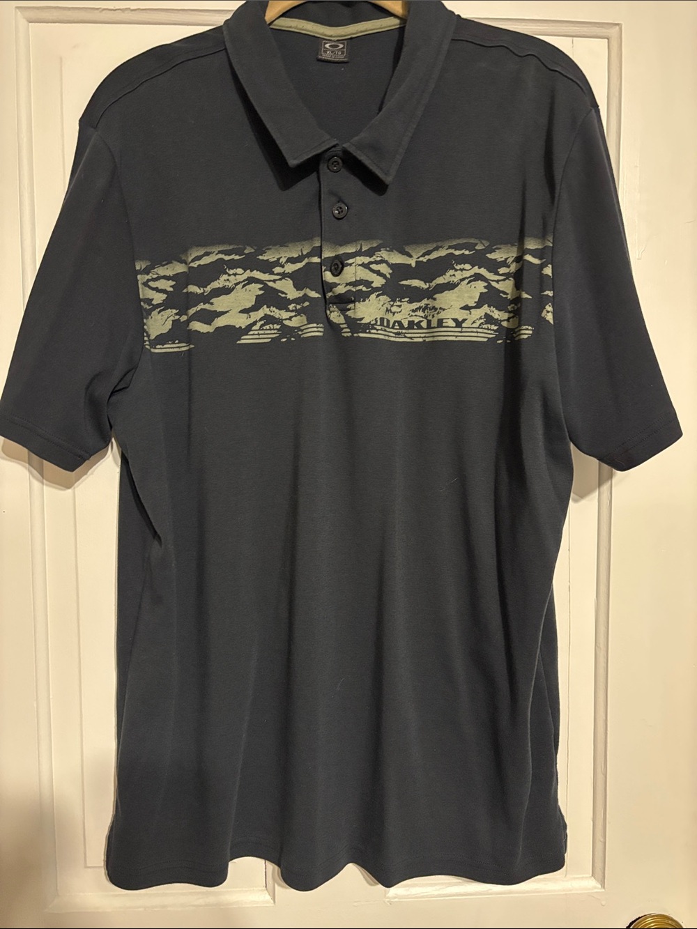 Oakley Men’s Charcoal Polo with Light Gray Chest Graphic